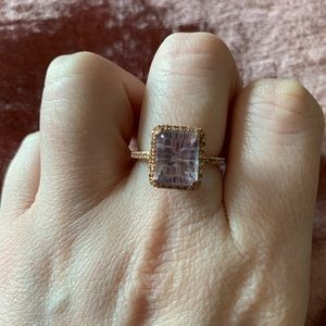 Amethyst and diamond halo ring